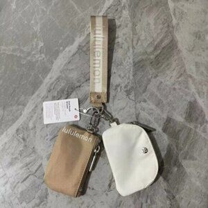 Brand new with tags Lululemon dual pouch keychain